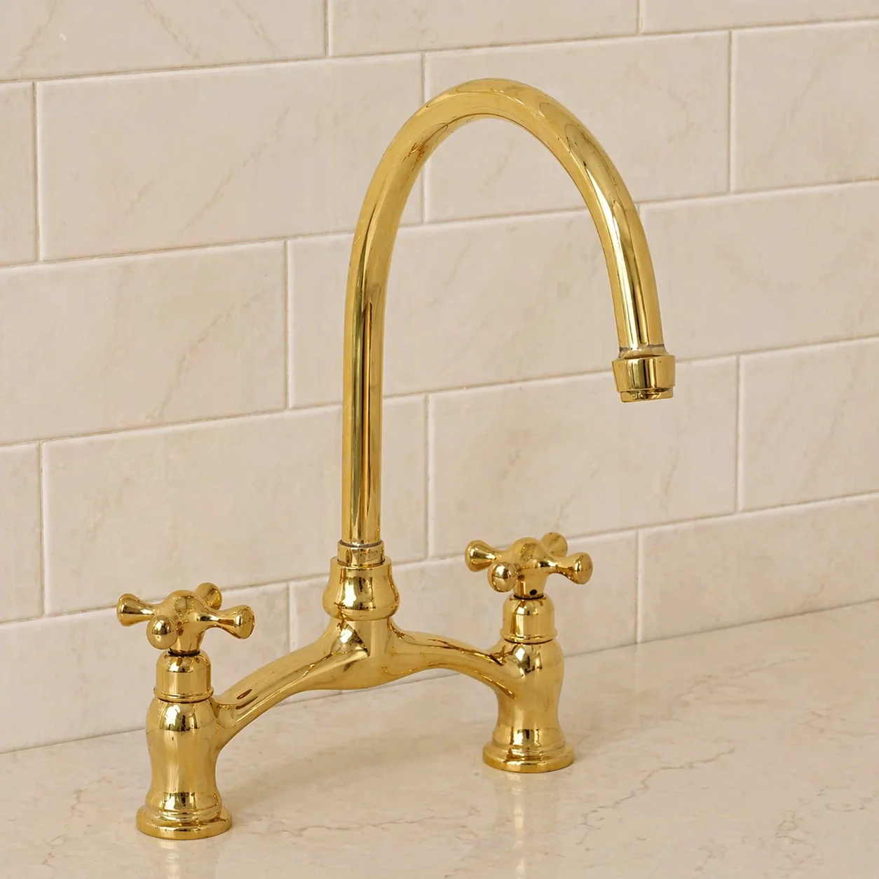 unlacquered brass bridge kitchen faucet